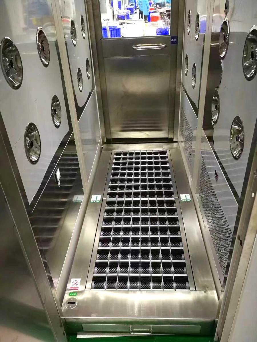Automated Sole Cleaning Module Inside Air Shower Automated Sole Cleaning Module Inside Air Shower